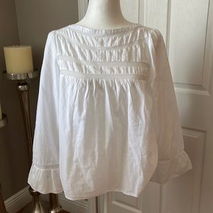 White button down top.